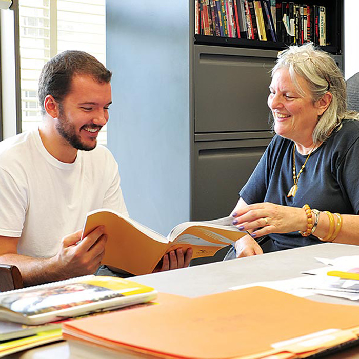 Student meeting with faculty member