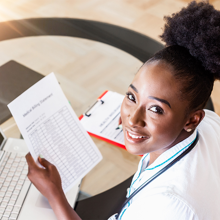 Medical professional holding records