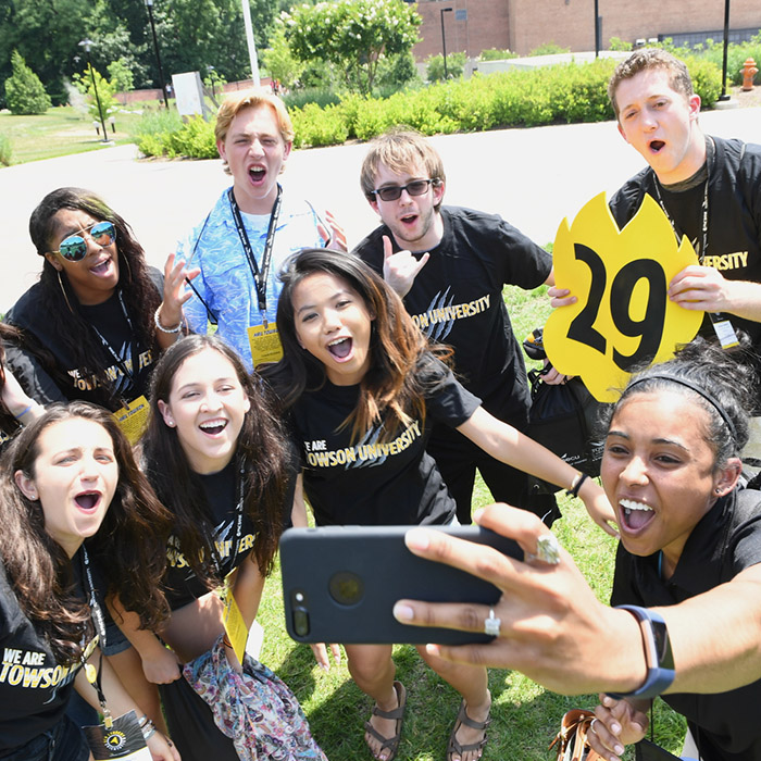 Orientation group smiling at camera